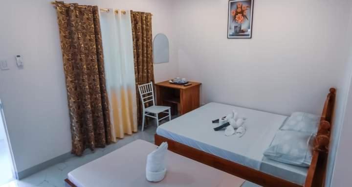 Elnora Delmar Travellers Inn Siquijor Dış mekan fotoğraf
