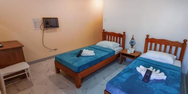 Elnora Delmar Travellers Inn Siquijor Dış mekan fotoğraf
